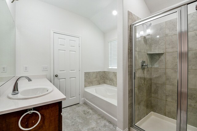 167 Courageous Side Way, Magnolia, TX 77354 - full bath with a stall shower, a bath, vaulted ceiling, and vanity