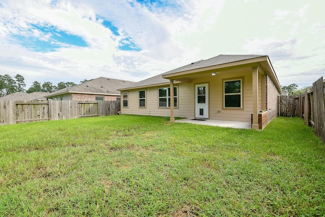 167 Courageous Side Way, Magnolia, TX 77354 - rear view of house featuring a patio and a fenced backyard