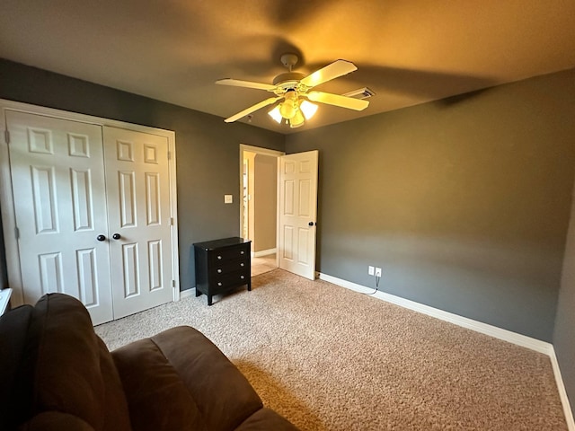 1040 Cardinal Dr, Richwood, TX 77566 - bedroom featuring carpet floors, a closet, and ceiling fan