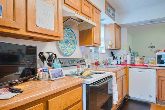 1805 Willow Bend Rd, Wharton, TX 77488 - kitchen featuring white appliances, under cabinet range hood, and wooden counters