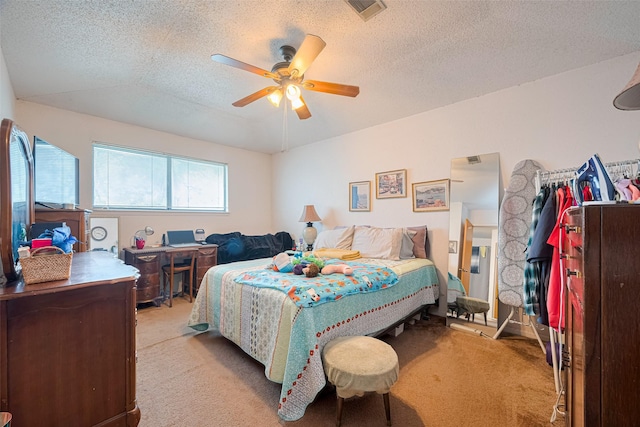 1805 Willow Bend Rd, Wharton, TX 77488 - bedroom with light carpet, a textured ceiling, and ceiling fan