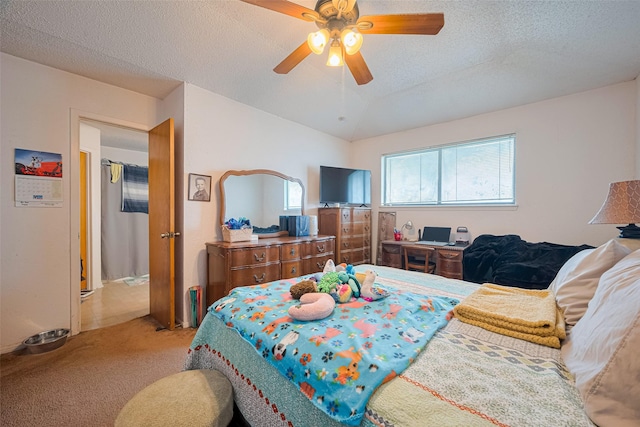 1805 Willow Bend Rd, Wharton, TX 77488 - bedroom with light colored carpet, ceiling fan, a textured ceiling, and lofted ceiling