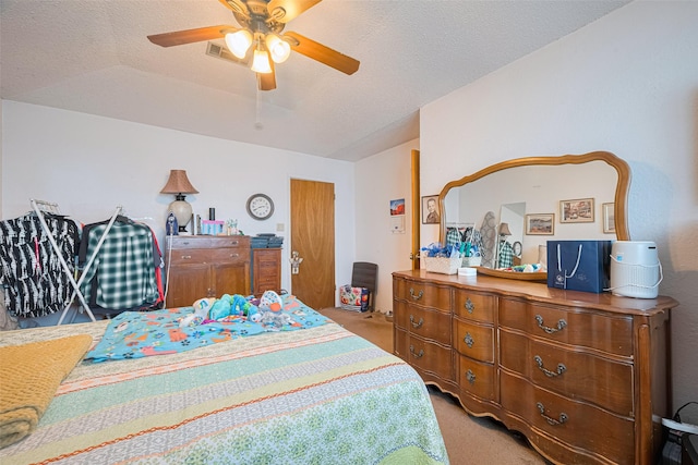 1805 Willow Bend Rd, Wharton, TX 77488 - bedroom with light colored carpet, ceiling fan, and a textured ceiling