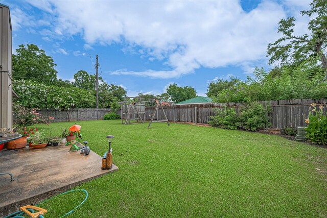 1805 Willow Bend Rd, Wharton, TX 77488 - fenced backyard with a patio