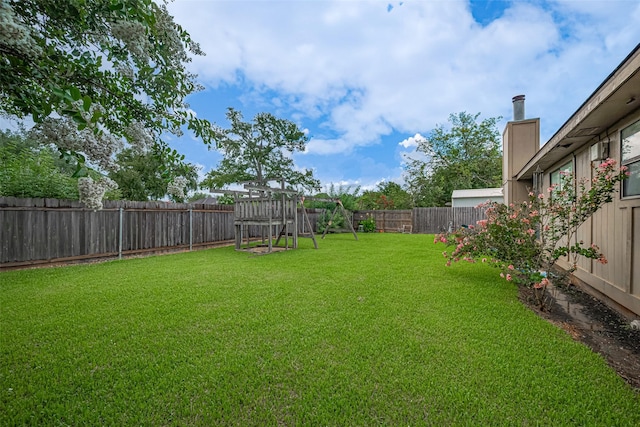 1805 Willow Bend Rd, Wharton, TX 77488 - fenced backyard with a playground