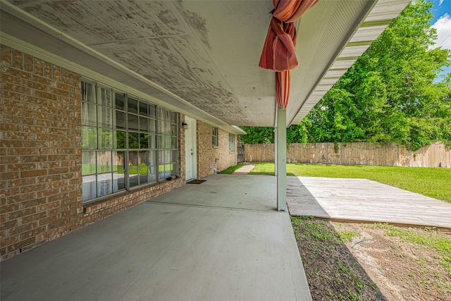 101 Wildrose St, Baytown, TX 77520 - fenced backyard featuring a patio area