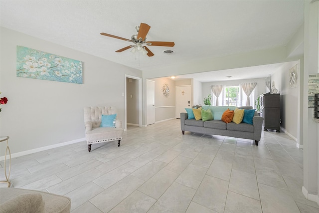 101 Wildrose St, Baytown, TX 77520 - living area with a ceiling fan and baseboards