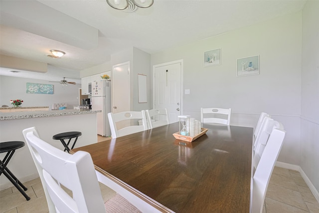 101 Wildrose St, Baytown, TX 77520 - dining area with light tile patterned floors and ceiling fan