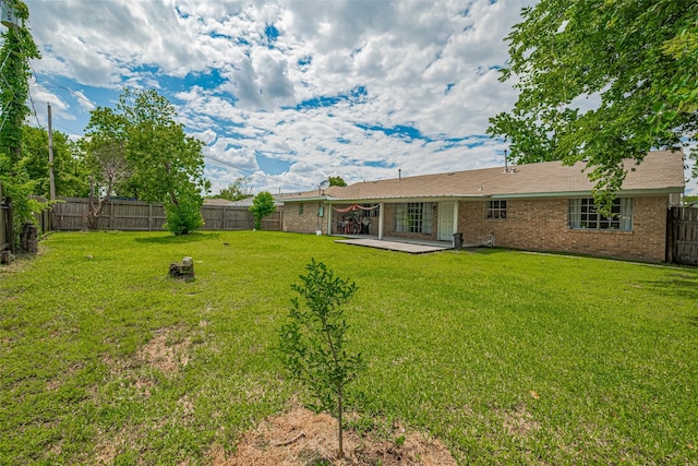 101 Wildrose St, Baytown, TX 77520 - fenced backyard featuring a patio area