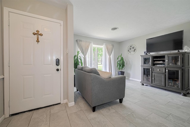 101 Wildrose St, Baytown, TX 77520 - living room featuring baseboards
