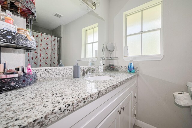 101 Wildrose St, Baytown, TX 77520 - bathroom with vanity and toilet