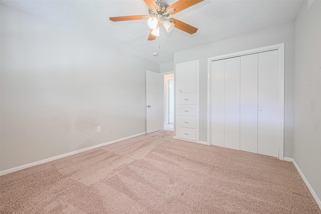 101 Wildrose St, Baytown, TX 77520 - unfurnished bedroom with carpet flooring, a closet, and ceiling fan