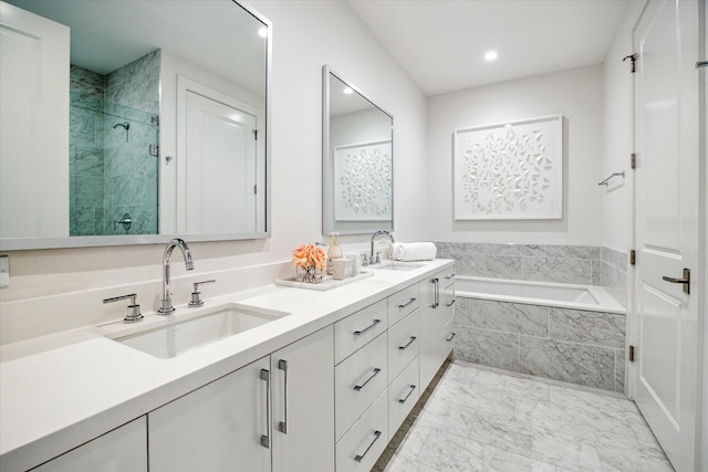 5656 San Felipe St Unit 606, Houston, TX 77056 - full bath featuring a garden tub, double vanity, a stall shower, marble look tiles, and recessed lighting