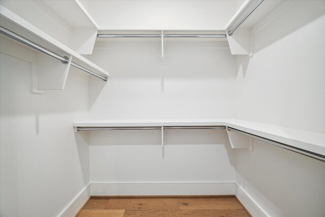 5656 San Felipe St Unit 606, Houston, TX 77056 - spacious closet featuring light wood-style floors