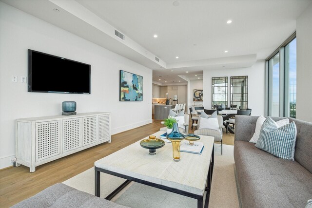 5656 San Felipe St Unit 606, Houston, TX 77056 - living room with wood finished floors and recessed lighting