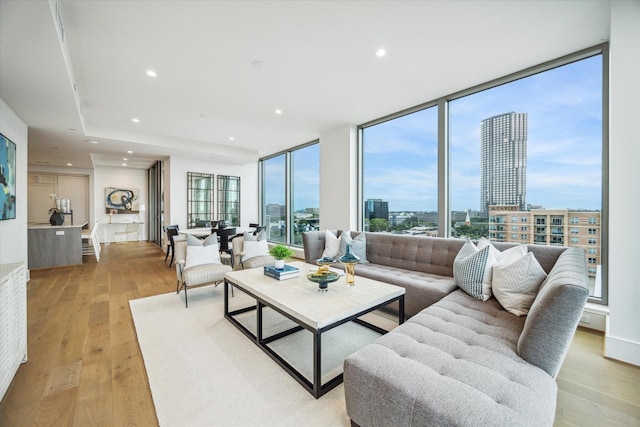 5656 San Felipe St Unit 606, Houston, TX 77056 - living room featuring a view of city, light wood-style floors, and recessed lighting