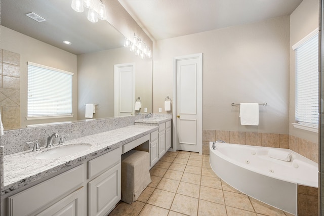 4607 Wellbrook Ln, Katy, TX 77450 - full bath with double vanity, a jetted tub, and tile patterned floors