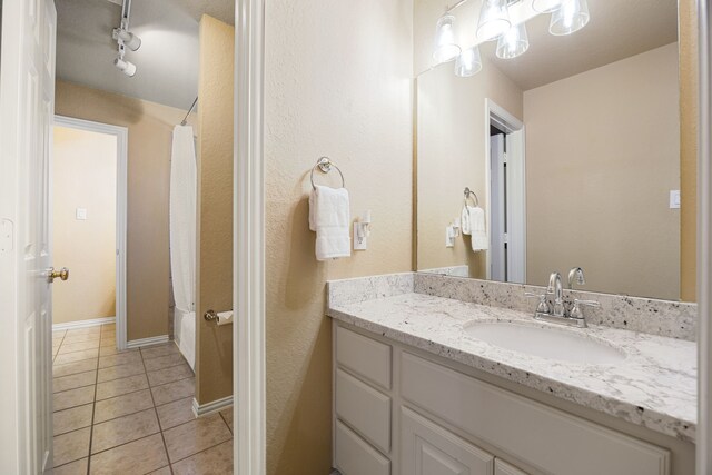 4607 Wellbrook Ln, Katy, TX 77450 - bathroom featuring vanity, tile patterned floors, and a shower with shower curtain