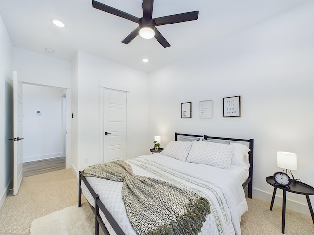 8319 Springwood Canyon Ln, Houston, TX 77055 - bedroom featuring light carpet, recessed lighting, and a ceiling fan