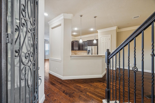 5708 Petty St Unit B, Houston, TX 77007 - entryway with dark wood finished floors, crown molding, recessed lighting, and stairs