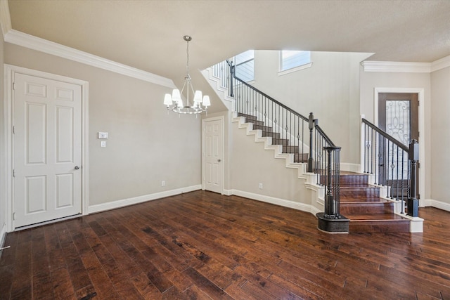 5708 Petty St Unit B, Houston, TX 77007 - entryway with a chandelier, wood-type flooring, stairs, and crown molding