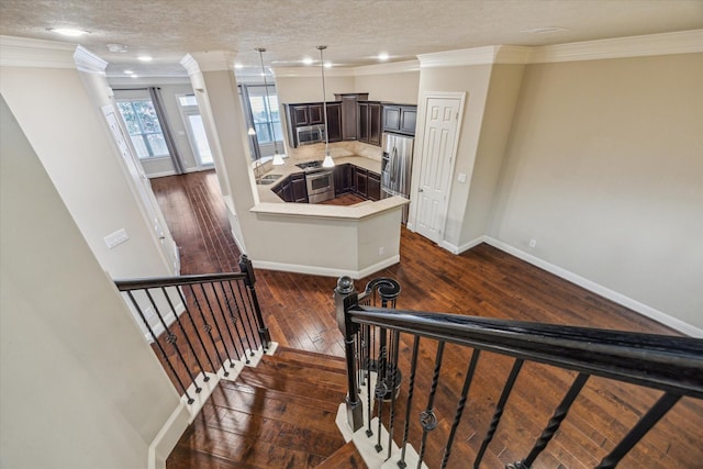 5708 Petty St Unit B, Houston, TX 77007 - stairs with hardwood / wood-style flooring, crown molding, a textured ceiling, and recessed lighting