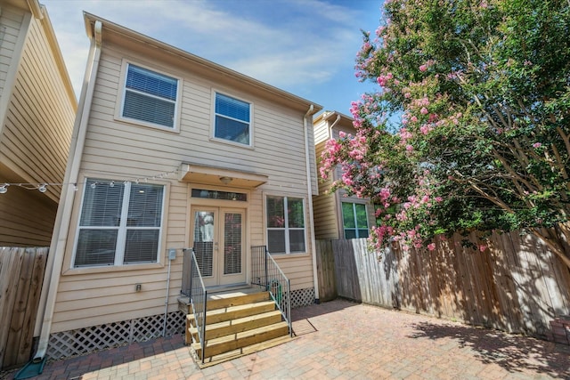 5708 Petty St Unit B, Houston, TX 77007 - view of front facade featuring entry steps, a patio area, and french doors
