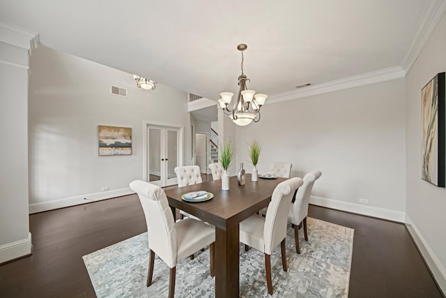 12102 N Founders Shore Dr, Cypress, TX 77433 - dining room with a chandelier, french doors, dark wood finished floors, and crown molding