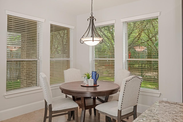 12102 N Founders Shore Dr, Cypress, TX 77433 - tiled dining area with baseboards