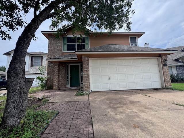 1629 Sylvia Ct, Round Rock, TX 78681 - traditional home with concrete driveway, brick siding, and a garage