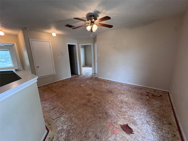 1629 Sylvia Ct, Round Rock, TX 78681 - empty room featuring a textured ceiling and ceiling fan