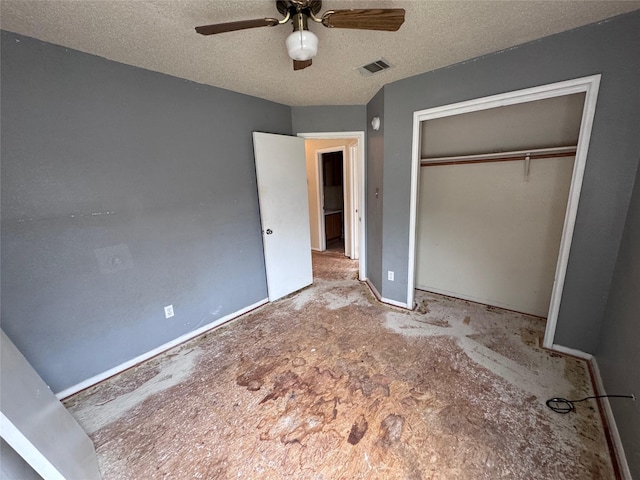 1629 Sylvia Ct, Round Rock, TX 78681 - unfurnished bedroom featuring a closet, a textured ceiling, and a ceiling fan