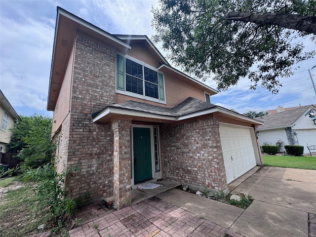 1629 Sylvia Ct, Round Rock, TX 78681 - view of front facade featuring brick siding, a garage, and concrete driveway