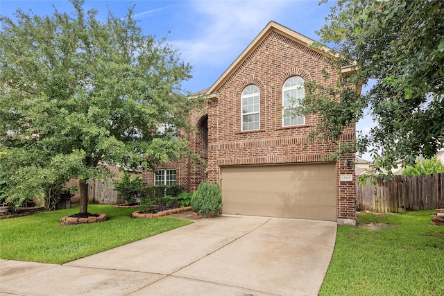 15315 Skyhill Dr, Cypress, TX 77433 - view of front of home featuring brick siding, driveway, and a garage