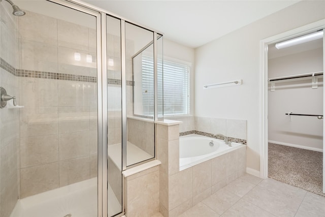 15315 Skyhill Dr, Cypress, TX 77433 - full bath with a stall shower, a garden tub, a walk in closet, and tile patterned floors