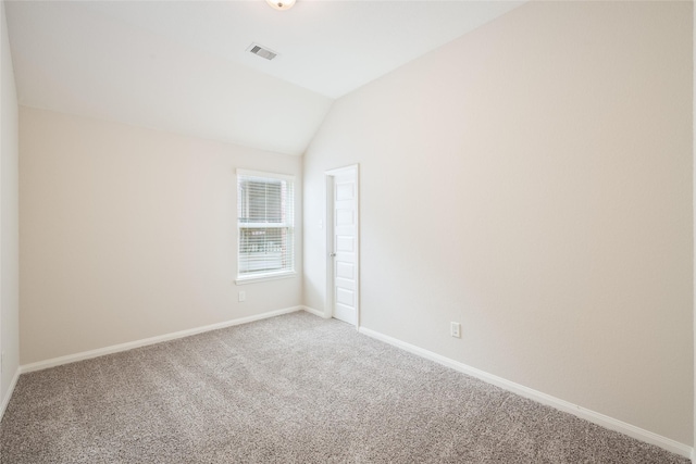 15315 Skyhill Dr, Cypress, TX 77433 - unfurnished room with light colored carpet and vaulted ceiling