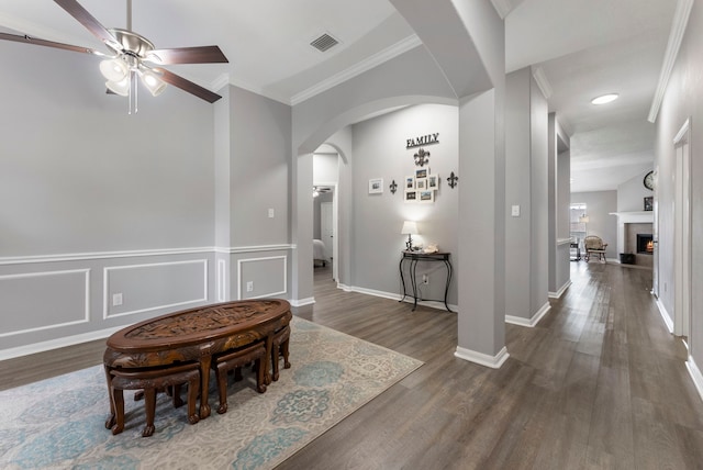 38318 E Sulphur Creek Dr, Magnolia, TX 77355 - corridor with arched walkways, crown molding, and wood finished floors