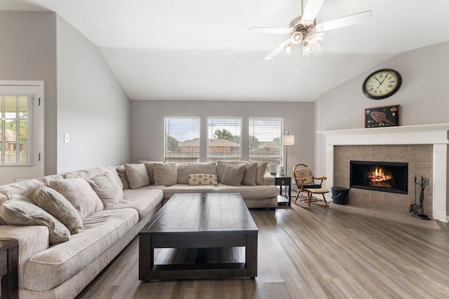 38318 E Sulphur Creek Dr, Magnolia, TX 77355 - living room featuring vaulted ceiling, wood finished floors, a fireplace, and ceiling fan