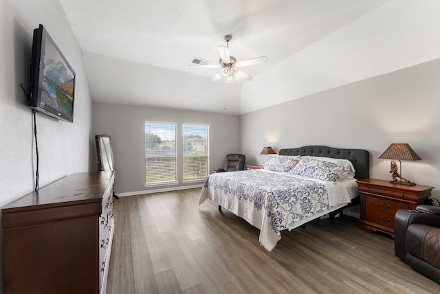 38318 E Sulphur Creek Dr, Magnolia, TX 77355 - bedroom featuring wood finished floors, ceiling fan, and vaulted ceiling