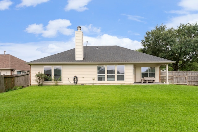 38318 E Sulphur Creek Dr, Magnolia, TX 77355 - rear view of property featuring a fenced backyard, a chimney, and a patio
