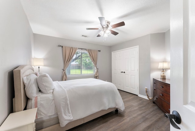 38318 E Sulphur Creek Dr, Magnolia, TX 77355 - bedroom with wood finished floors, a ceiling fan, and a closet