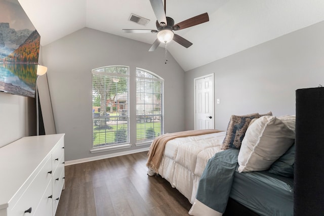38318 E Sulphur Creek Dr, Magnolia, TX 77355 - bedroom with vaulted ceiling, dark wood finished floors, multiple windows, and ceiling fan