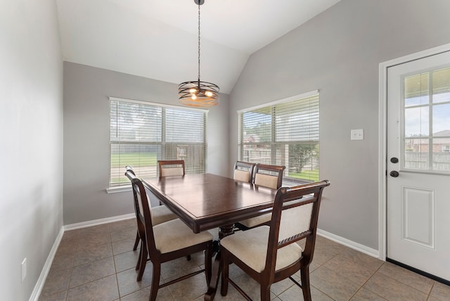 38318 E Sulphur Creek Dr, Magnolia, TX 77355 - dining room with vaulted ceiling, light tile patterned floors, and a chandelier