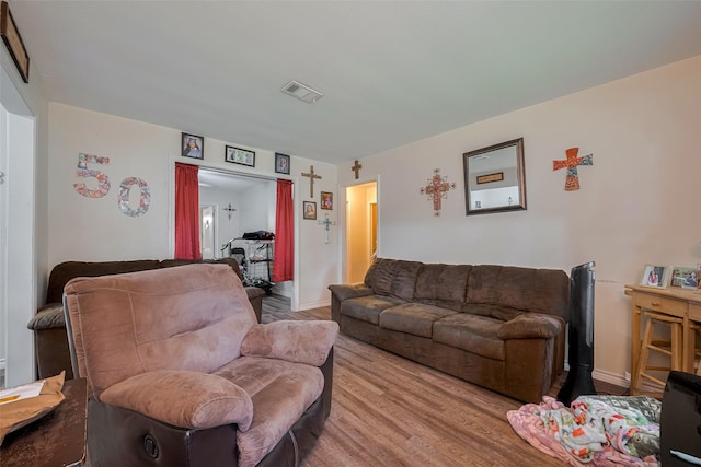 513 Frankie St, Wharton, TX 77488 - living room with baseboards and wood finished floors