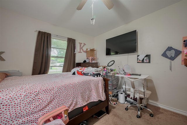 513 Frankie St, Wharton, TX 77488 - carpeted bedroom featuring a ceiling fan and baseboards