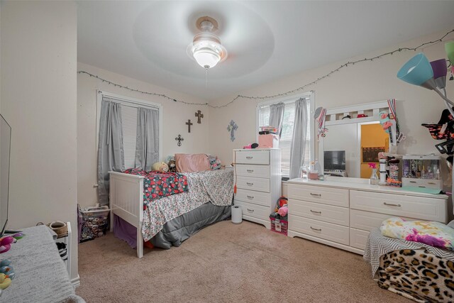 513 Frankie St, Wharton, TX 77488 - bedroom with light colored carpet and ceiling fan