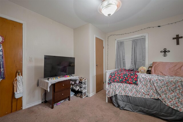 513 Frankie St, Wharton, TX 77488 - bedroom featuring carpet and a ceiling fan