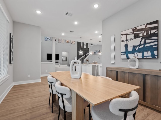 21310 Blue Wood Aster Ct, Cypress, TX 77433 - dining area featuring light wood-style floors and recessed lighting
