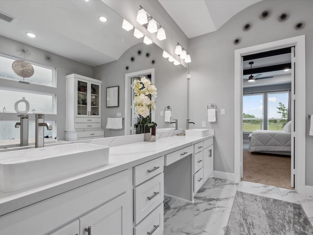 21310 Blue Wood Aster Ct, Cypress, TX 77433 - ensuite bathroom with double vanity, marble finish floors, a ceiling fan, and recessed lighting