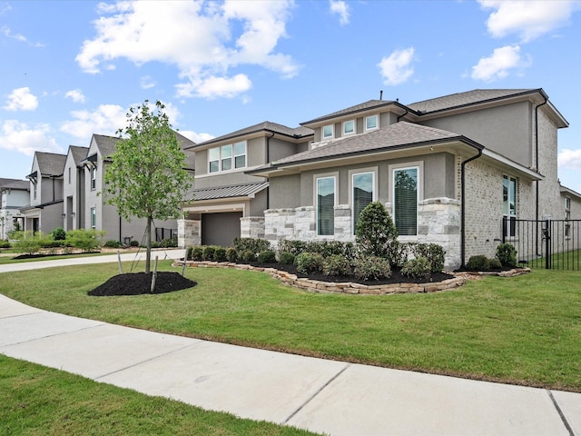 21310 Blue Wood Aster Ct, Cypress, TX 77433 - prairie-style house featuring stucco siding, a garage, and stone siding